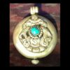 Sterling Silver Clamshell Gau with Turquoise Stone